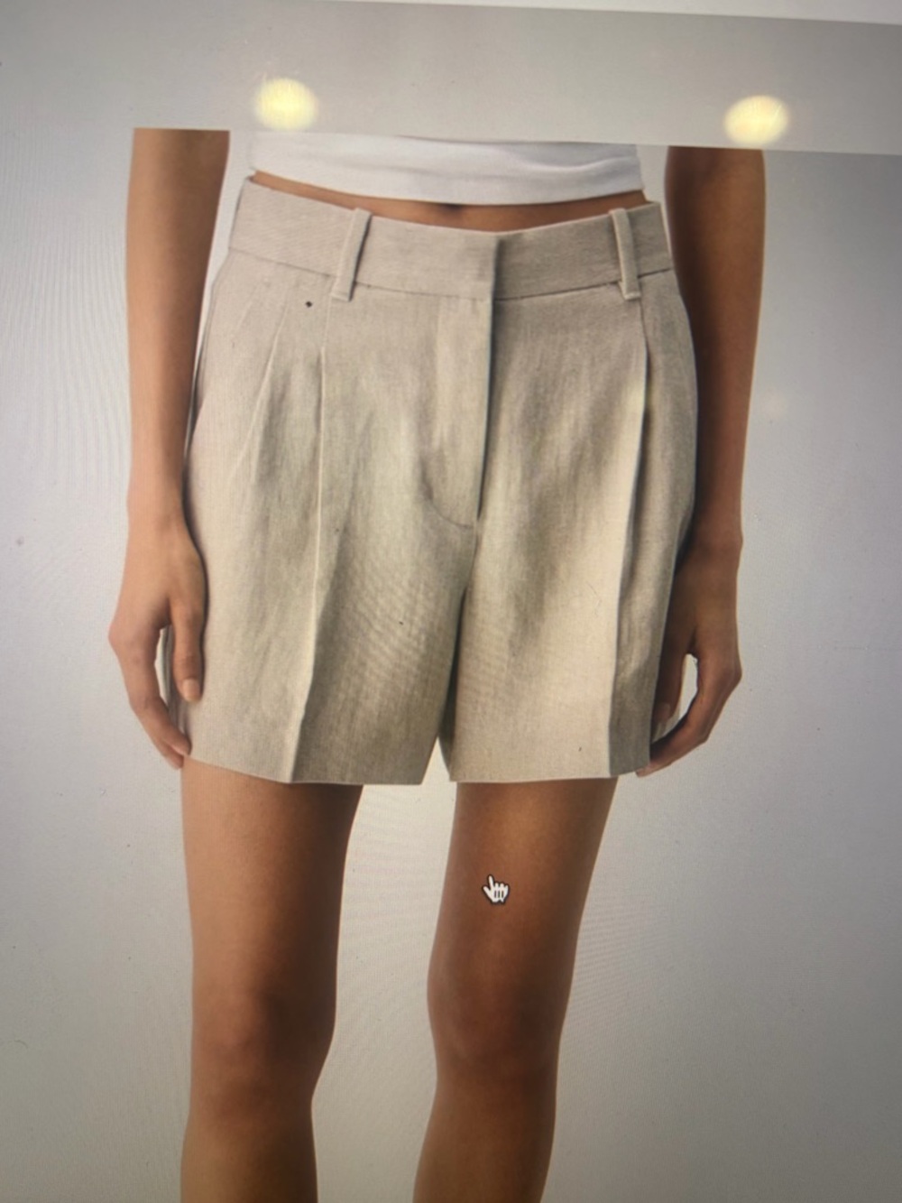 Aritzia Tailored High-Waist Pleated Shorts in Light Beige